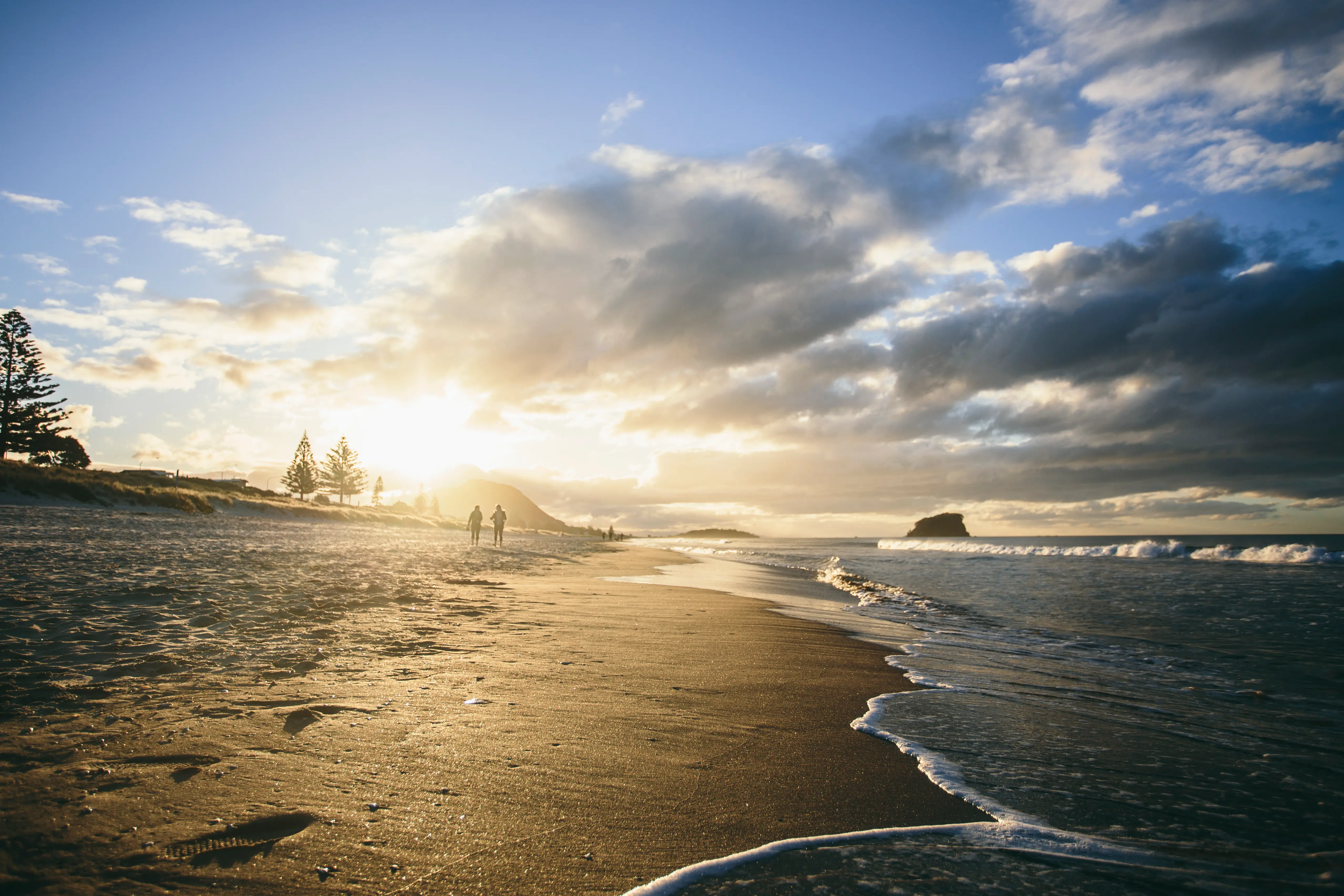 Sunset walk along Papamoa Beach