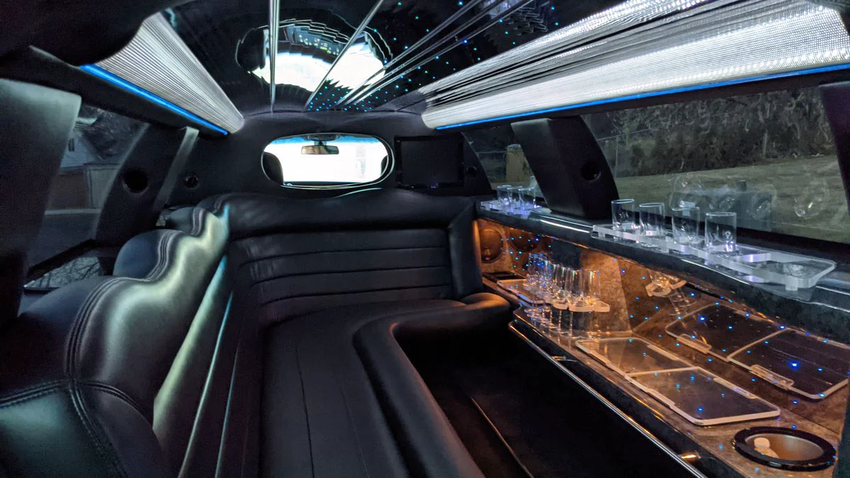 Passenger seating and lighting inside a stretch limousine