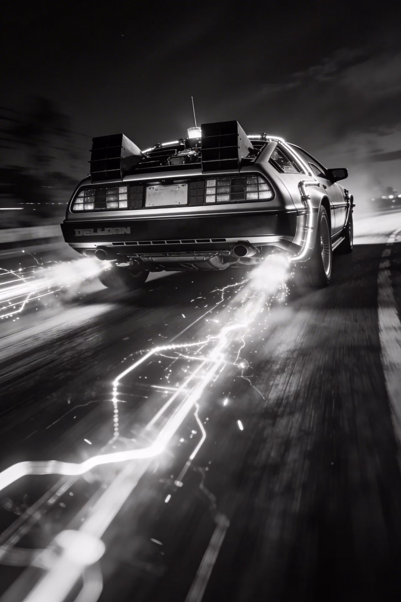 Rear view of a DeLorean sports car speeding at night with glowing light trails on the road.