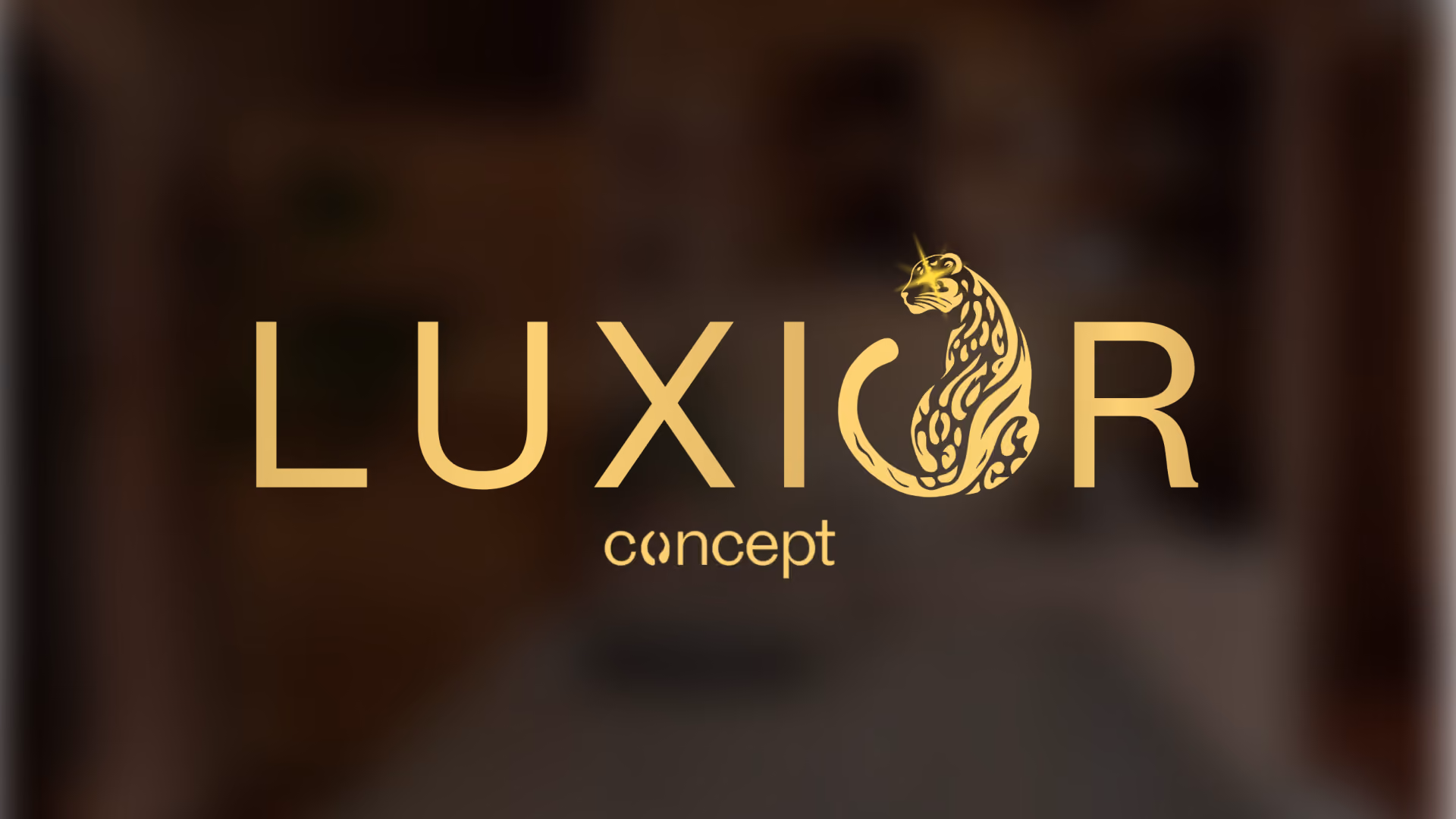 Gold text 'LUXIOR concept' with a stylized gold leopard replacing the letter O in LUXIOR.