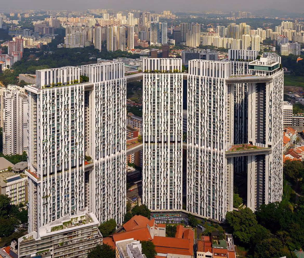 The Pinnacle@Duxton high-rise HDB development against the central Singapore skyline