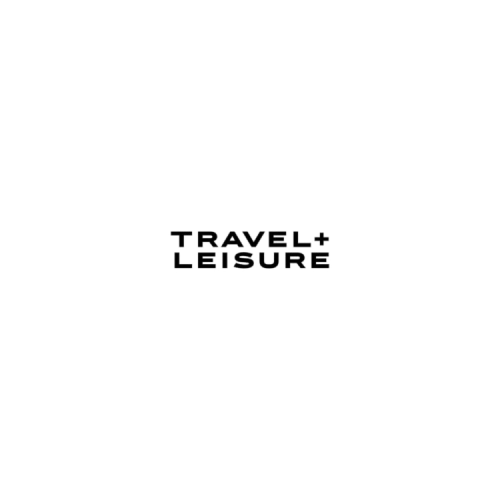 Travel + Leisure text logo in bold black font on a white background.