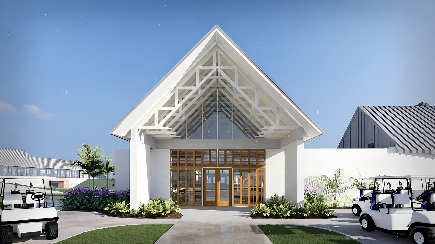 Modern white building entrance with wooden doors, glass roof, landscaped plants, and golf carts nearby.