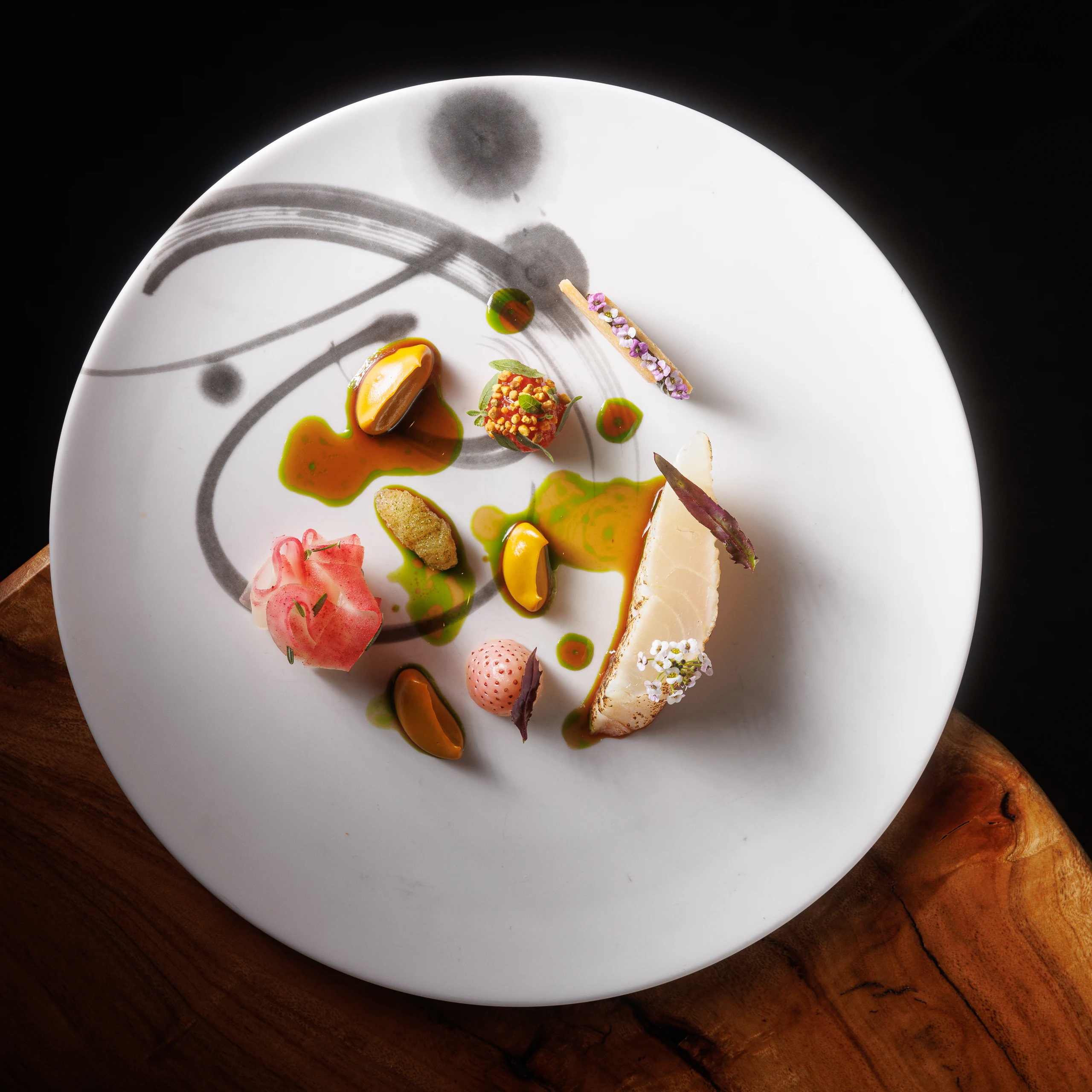 Artfully plated fine dining dish representing Michelin-recognized dining near Evermore Orlando Resort