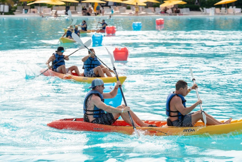 Guests racing kayaks during Evermore Bay Games.