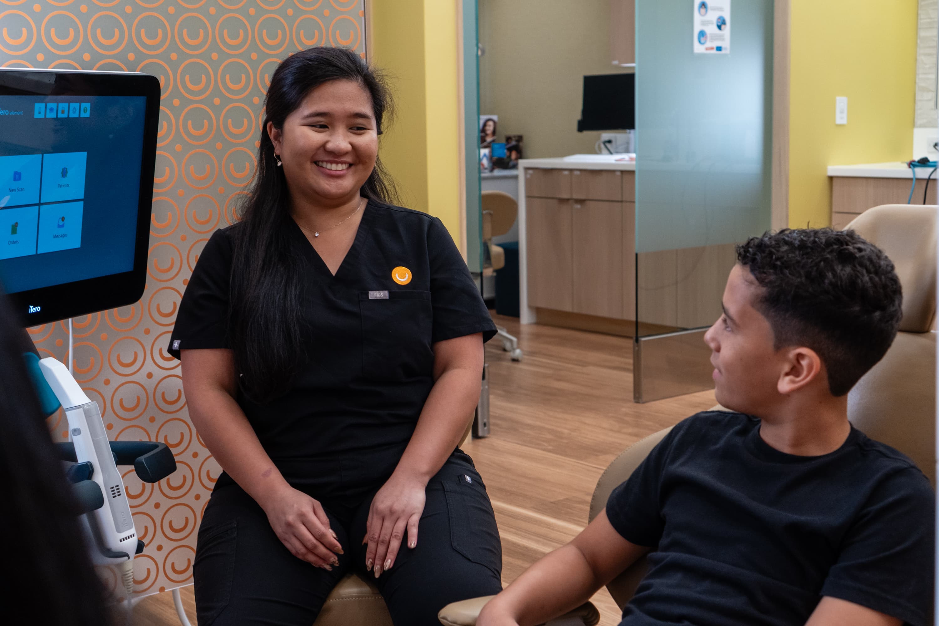 Orthodontist with patient