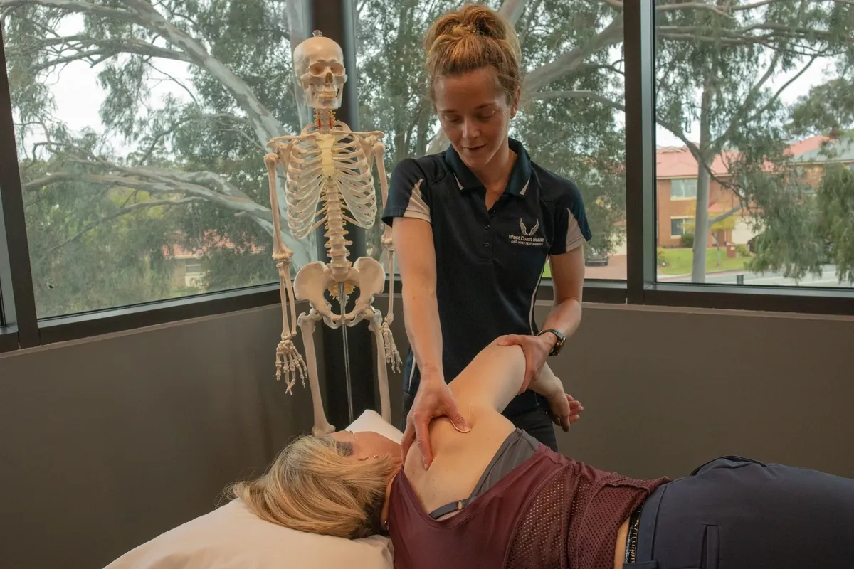 Physiotherapist performing a hands-on neck assessment at West Coast Health Physio North Beach