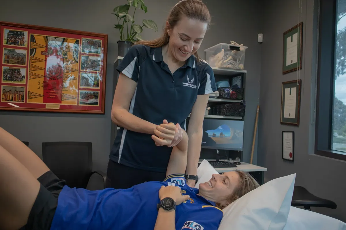 Physiotherapist treating a patient's shoulder at West Coast Health Physio North Beach