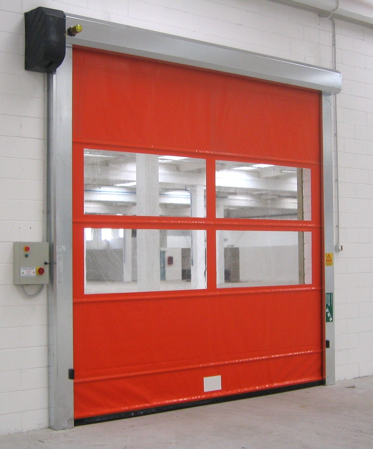 Porte souple rapide rouge avec hublots