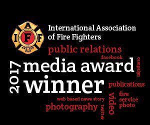San Jose Firefighters accepting an award for the Silver Spanner Newsletter