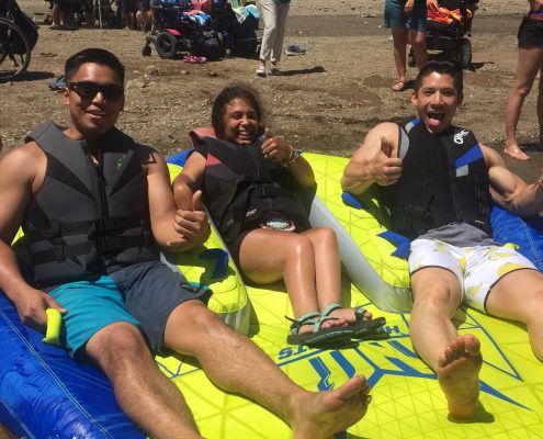Youth athletes enjoying Day on the Lake with San Jose Firefighters at Coyote Lake