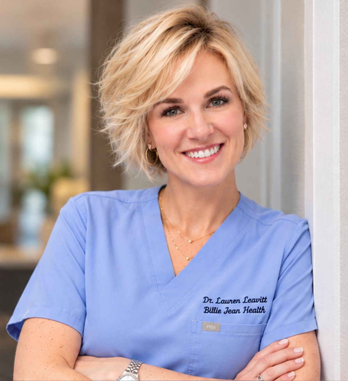 Dr. Lauren Leavitt smiling with her arms crossed