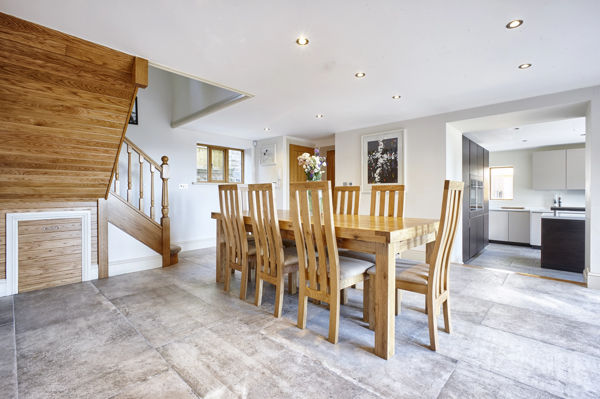 Open-plan dining room and staircase at Fieldings Farm, Whalley