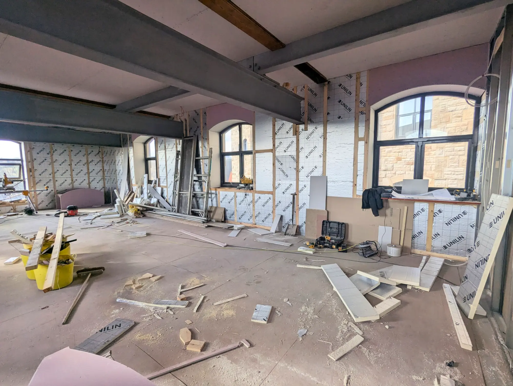 First floor mid fit-out with insulation boards at Black Sheep Coffee, Northlight