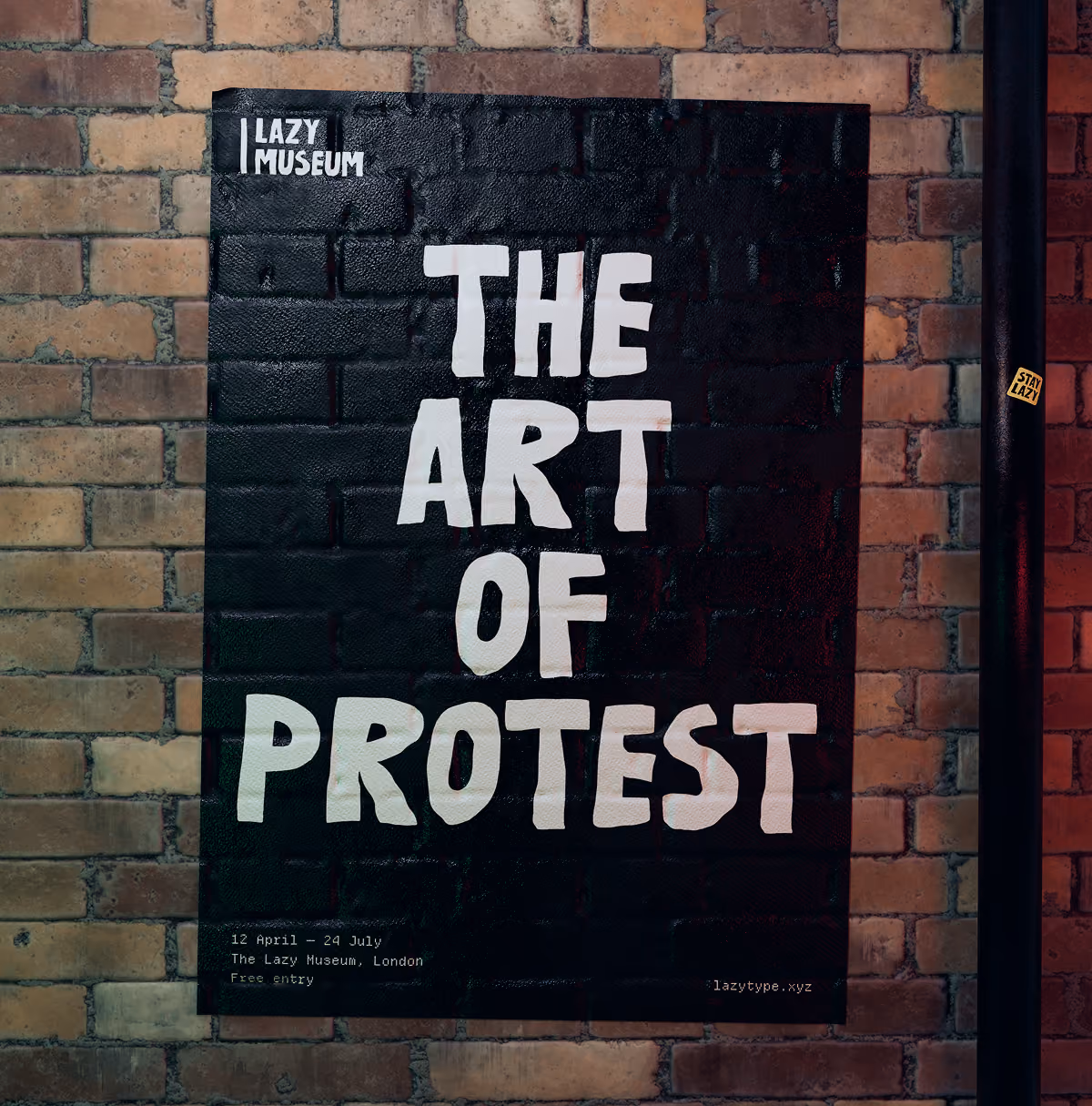 A LazyType Mockup showing a black poster pasted on a brick wall with white text: The Art of Protest, Lazy Museum exhibition details.