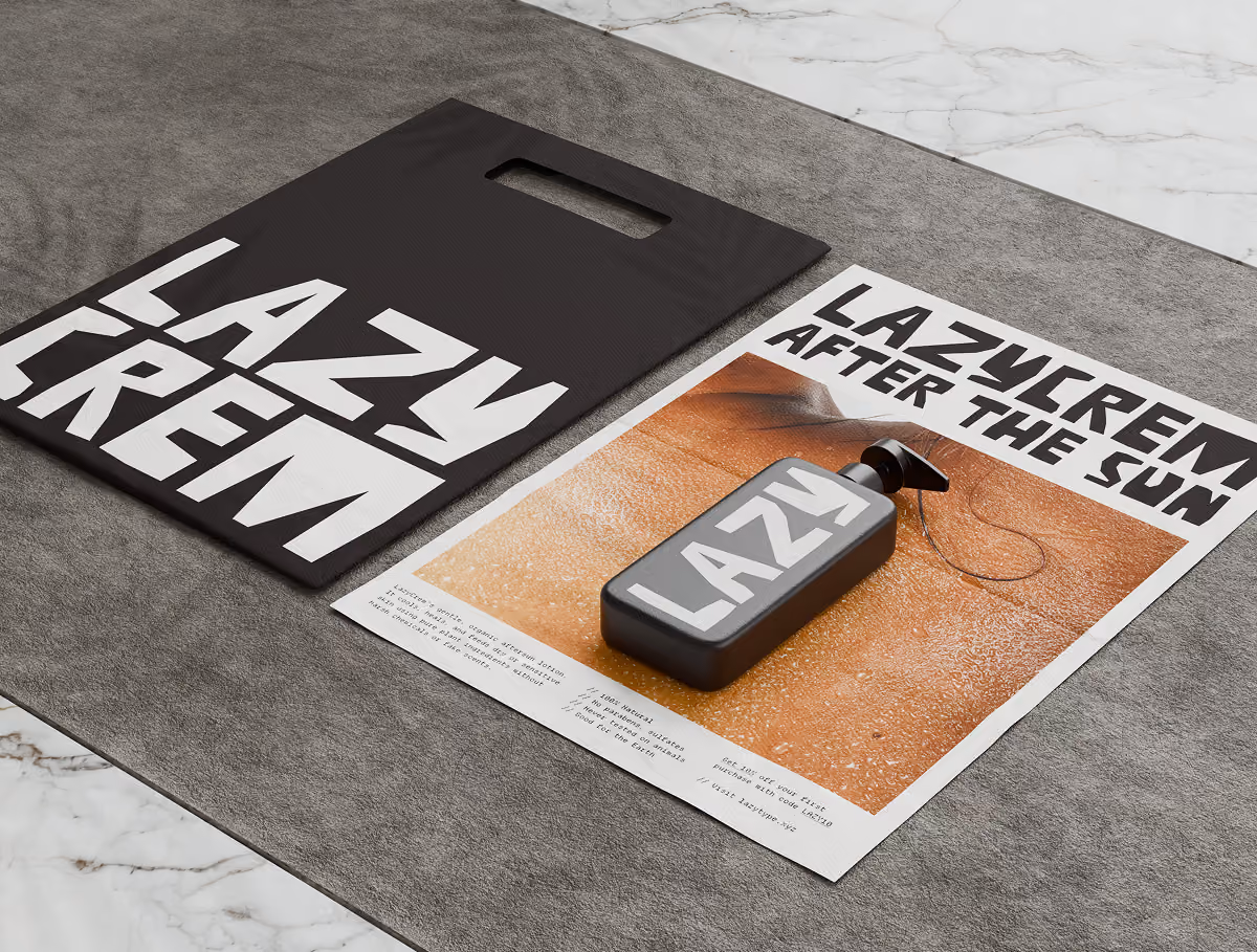 A LazyType Mockup showing a black bag with 'LAZY CREM' in white text next to a flyer showing and a bottle labeled LAZY on a flyer.