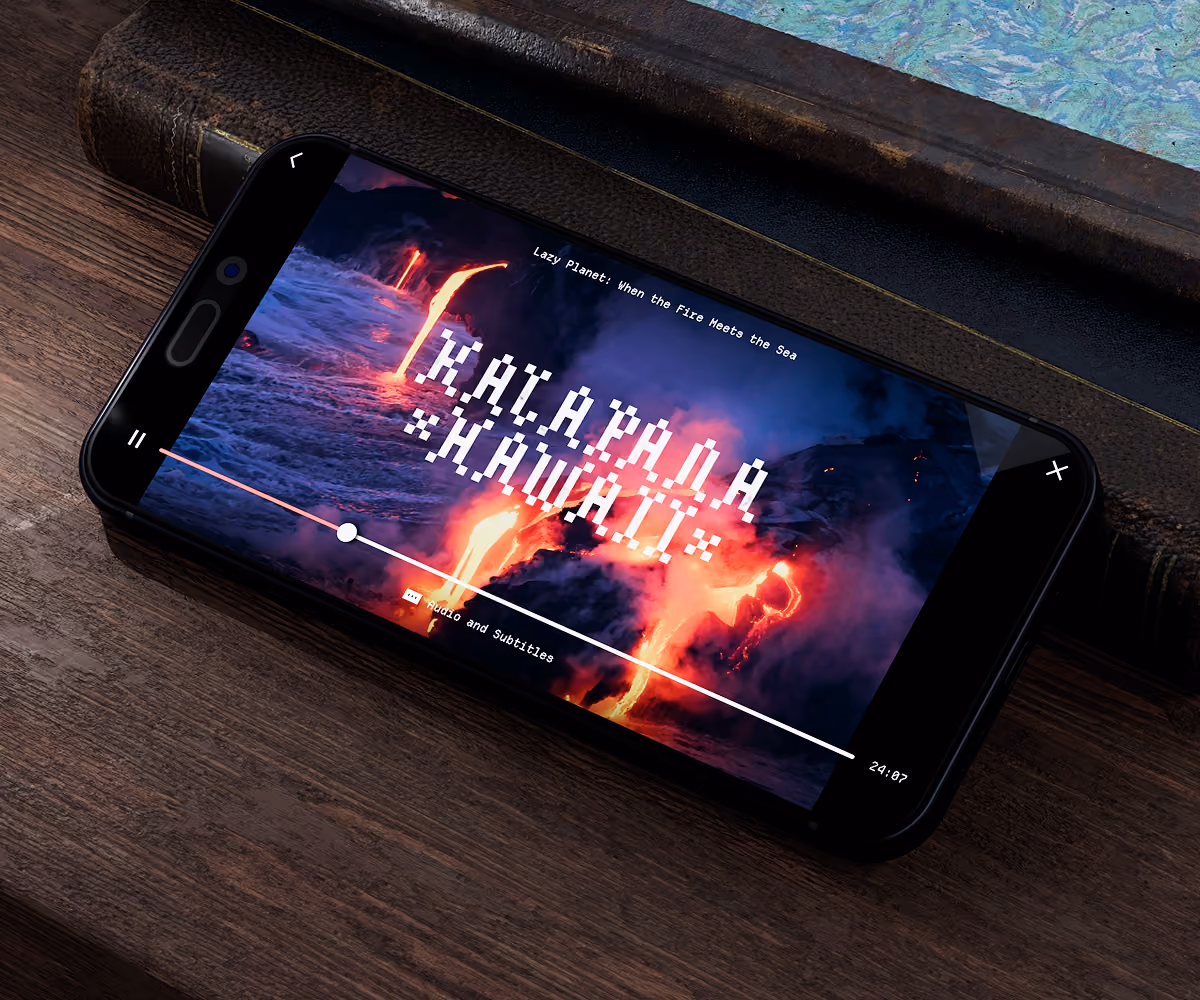 A LazyType Mockup with a smartphone playing a video titled 'Kalapana Hawaii' showing lava flowing into the sea.