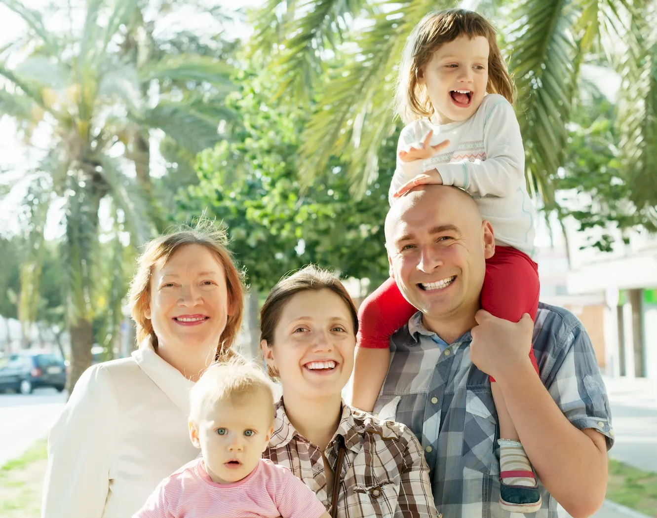 Three generations of a family together outdoors