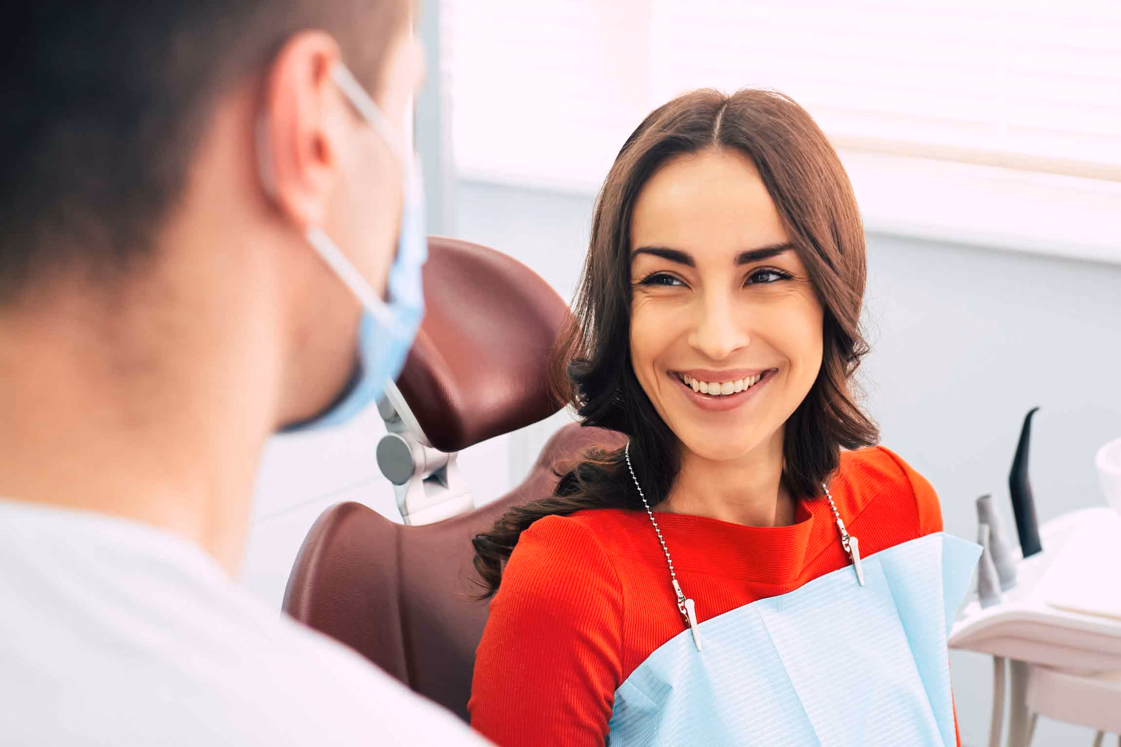 Woman smiling after a dental exam