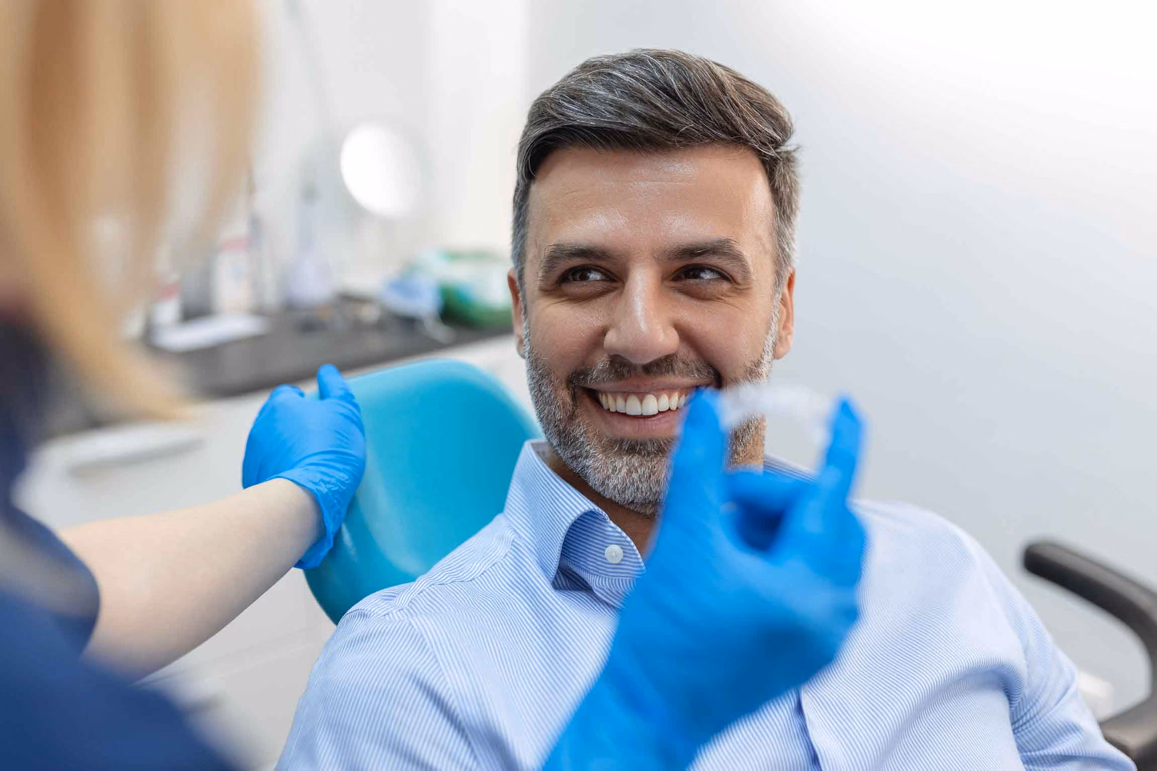 Man smiling during dental visit