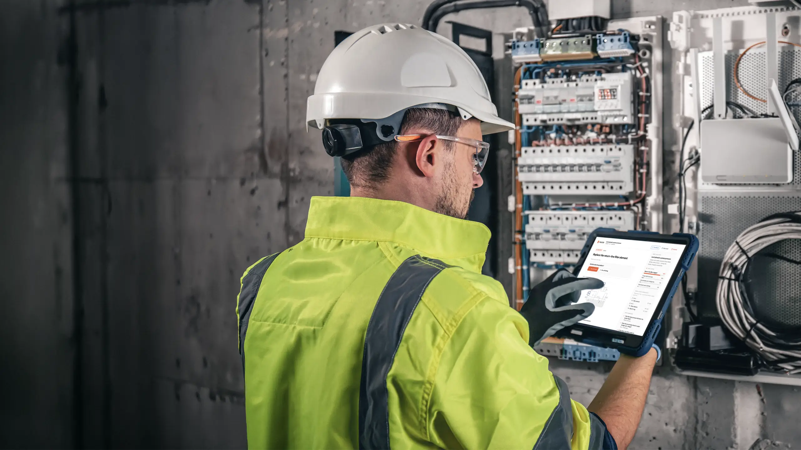 Field service technician using Dezide on a tablet