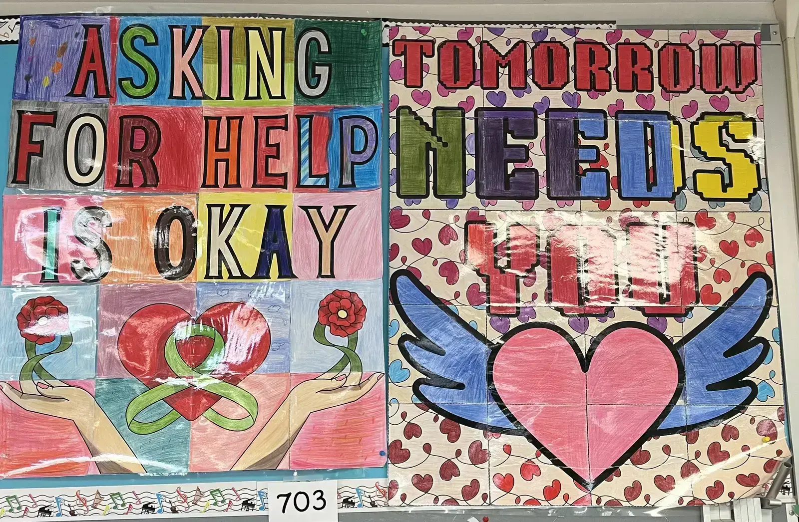 Student artwork posters with mental health messages asking for help