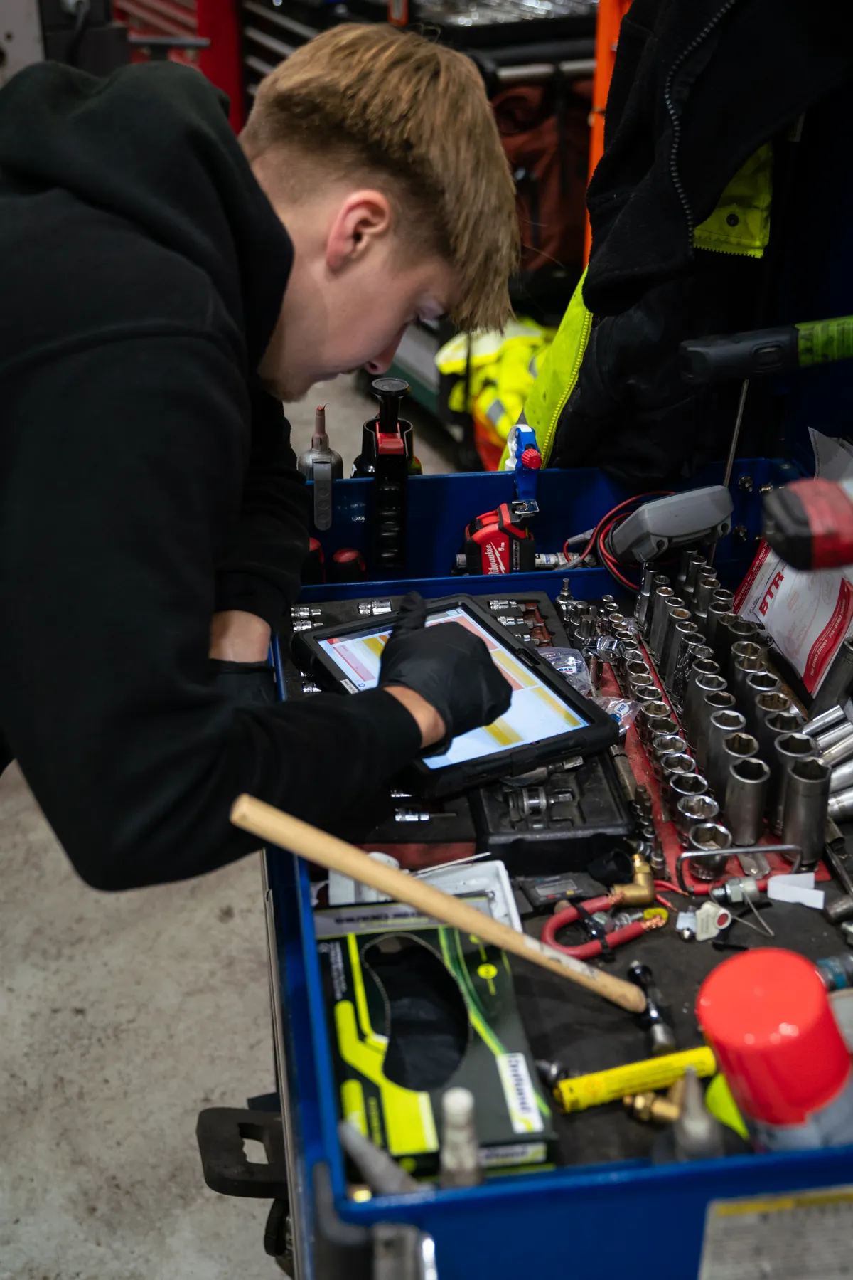 Young technician working on bench