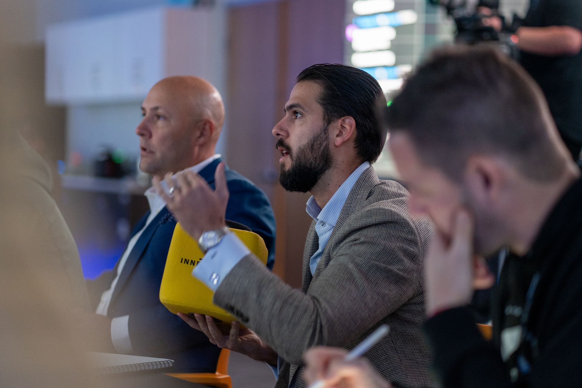 Jose Perez Ramos asking a question at a business conference