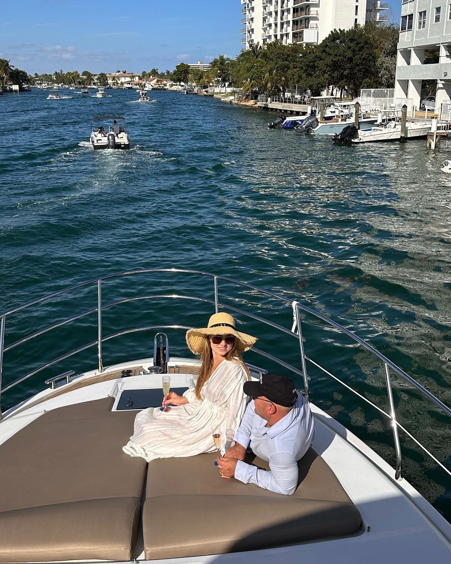 Edward Collins and Irina Collins on a yacht