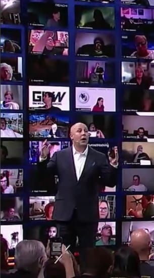 Edward Collins talking on stage
