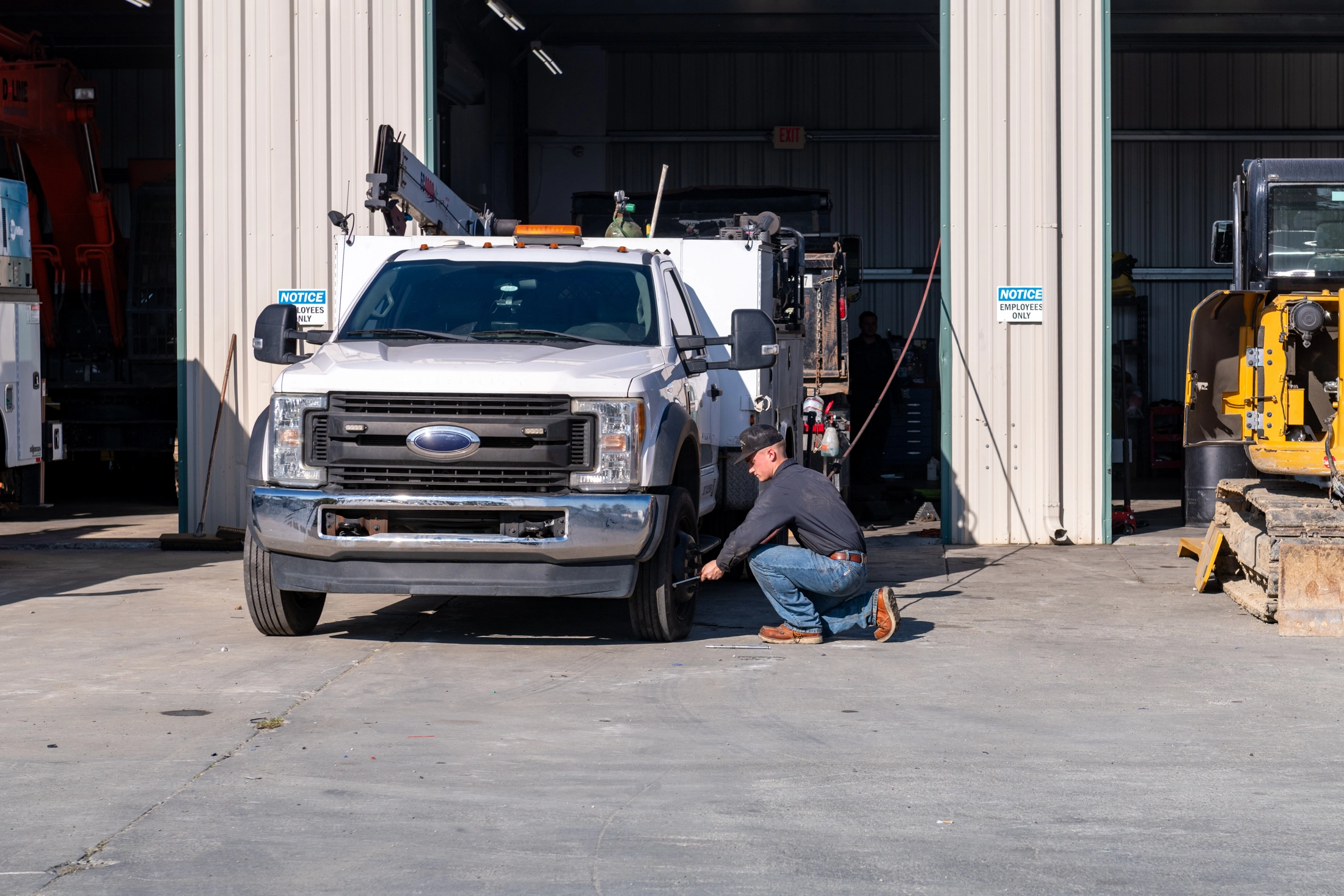 Mechanic performing truck repair in Alvin, TX
