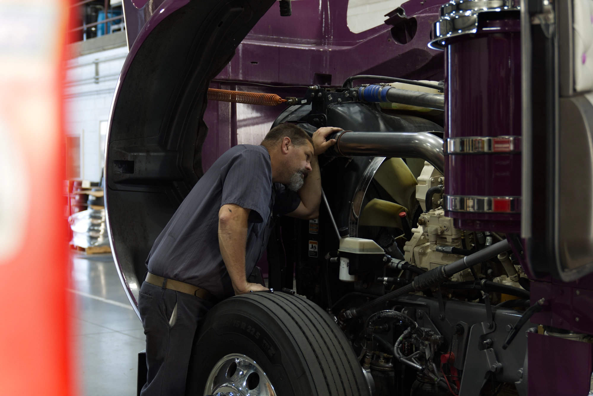 Mechanic performing truck repair in Alvin, TX