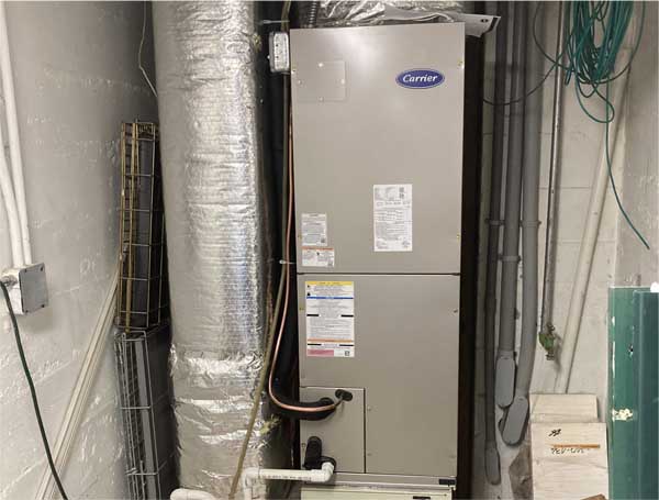 HVAC service diagnosing AC system in Boston, MA