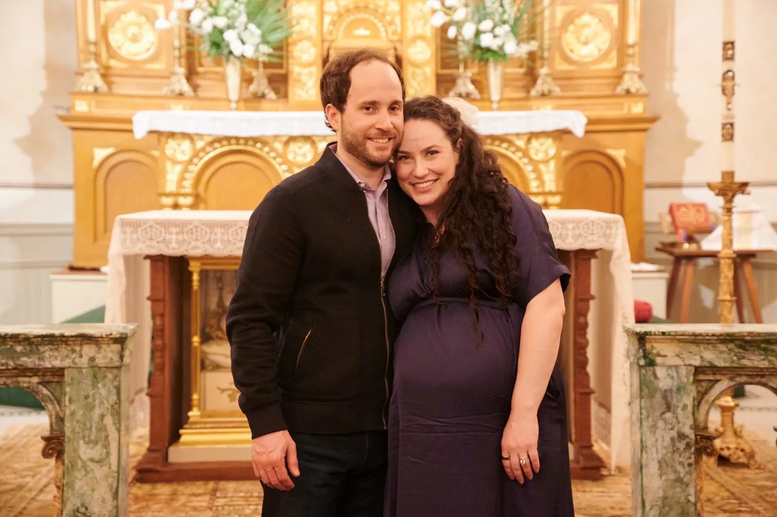 An expecting couple at the Easter Vigil at St. Patrick's
