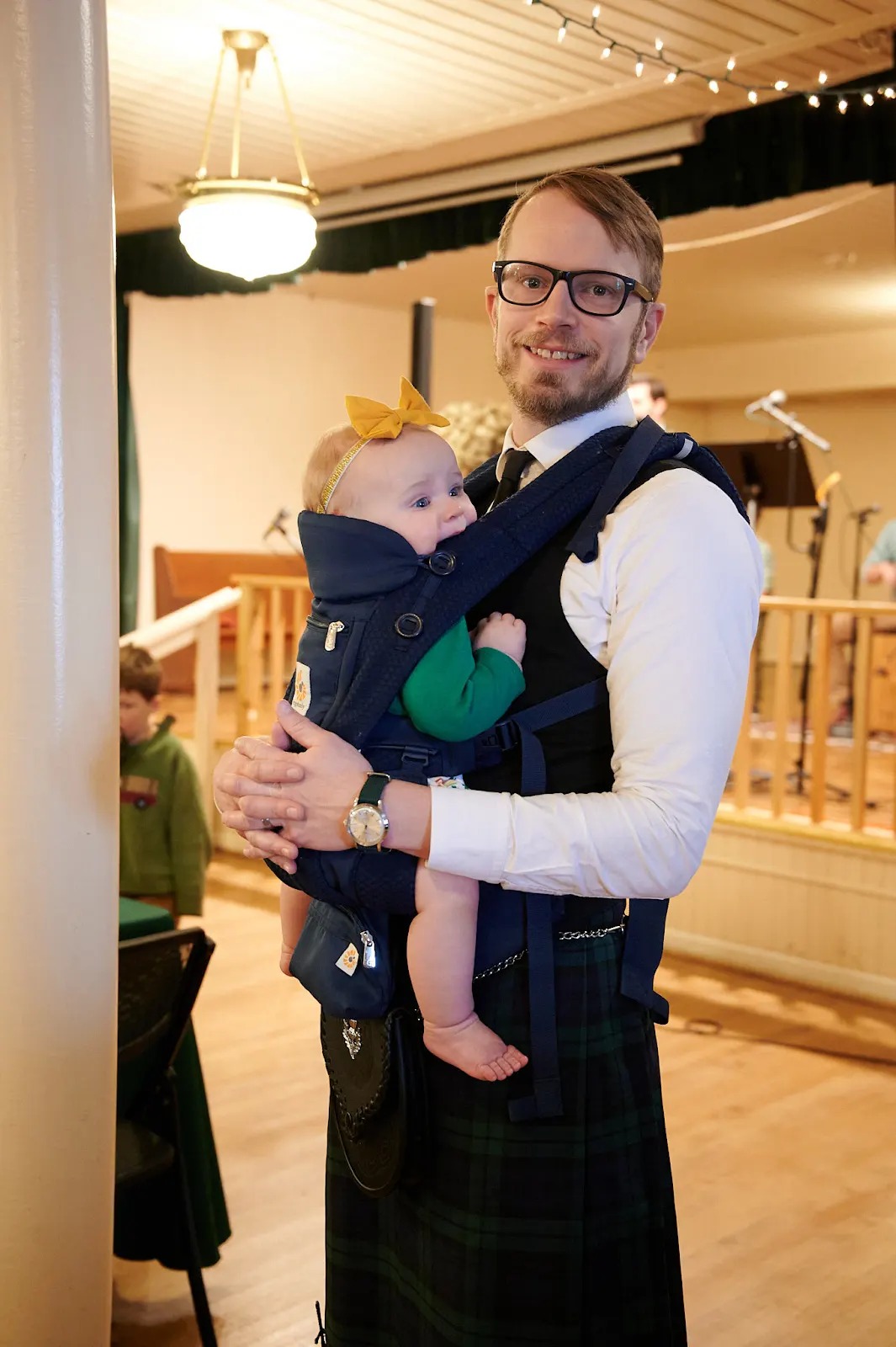 A father and his toddler at the St. Patrick's Day dinner