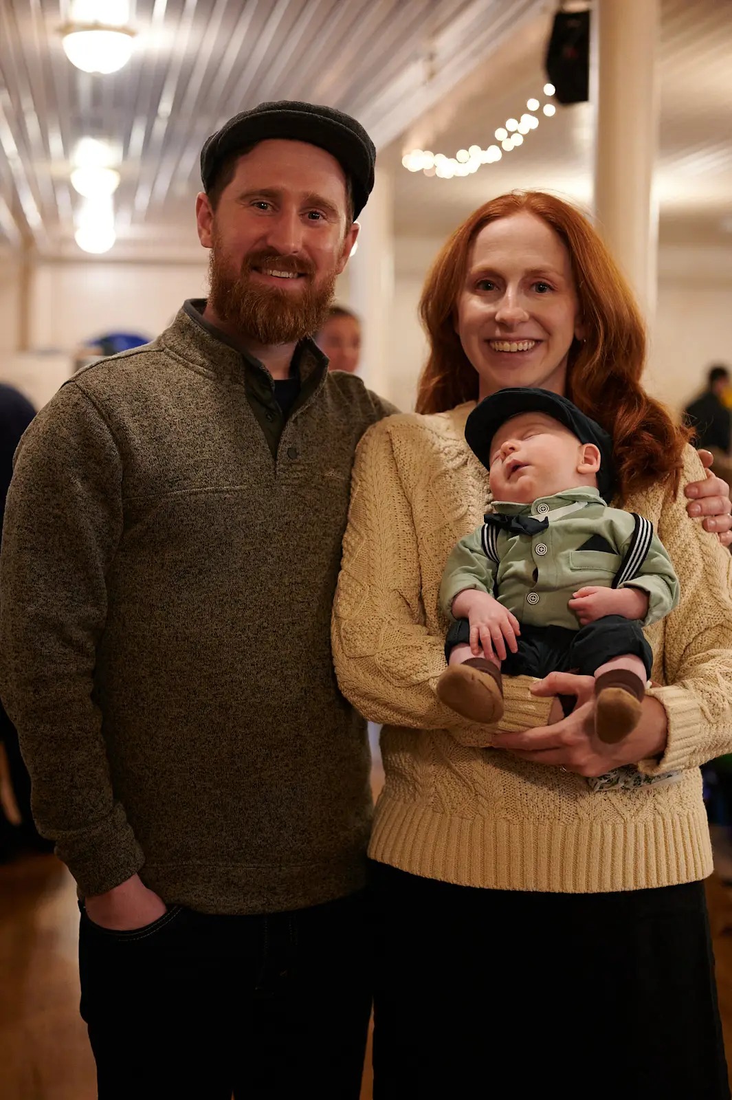 A young family with their infant at St. Patrick's
