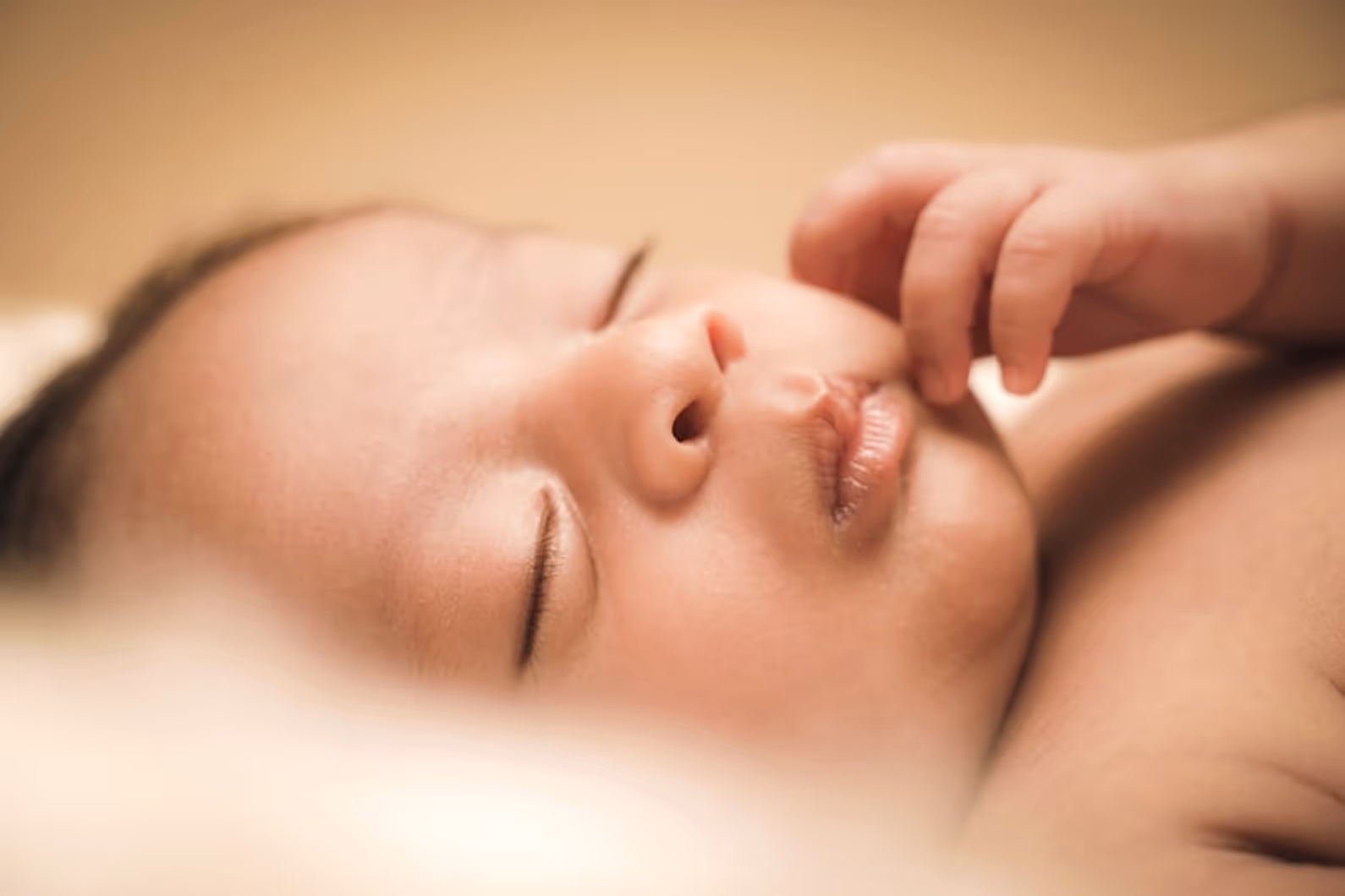 A peaceful sleeping newborn.