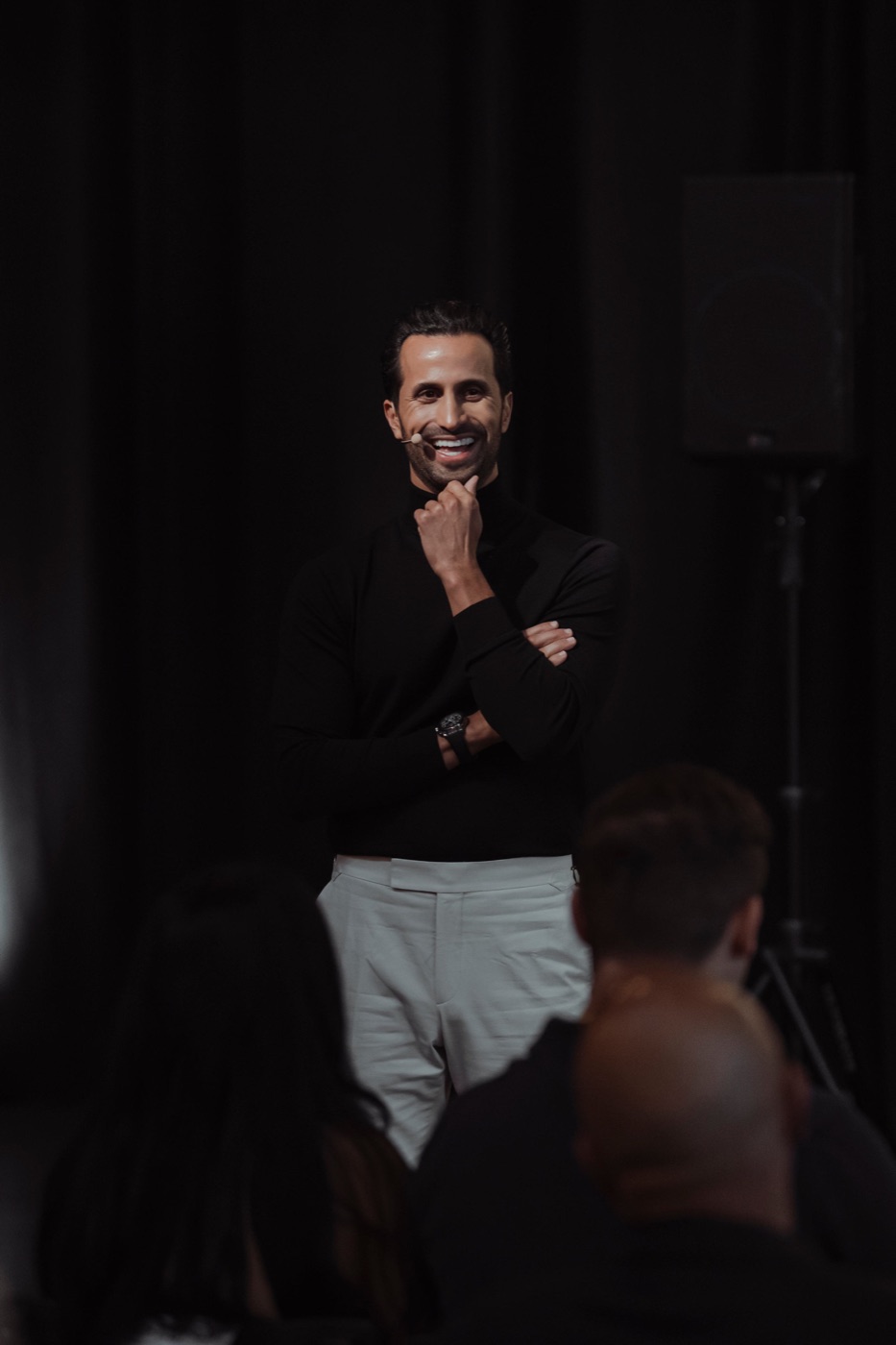 David Ghiyam speaking with an audience member
