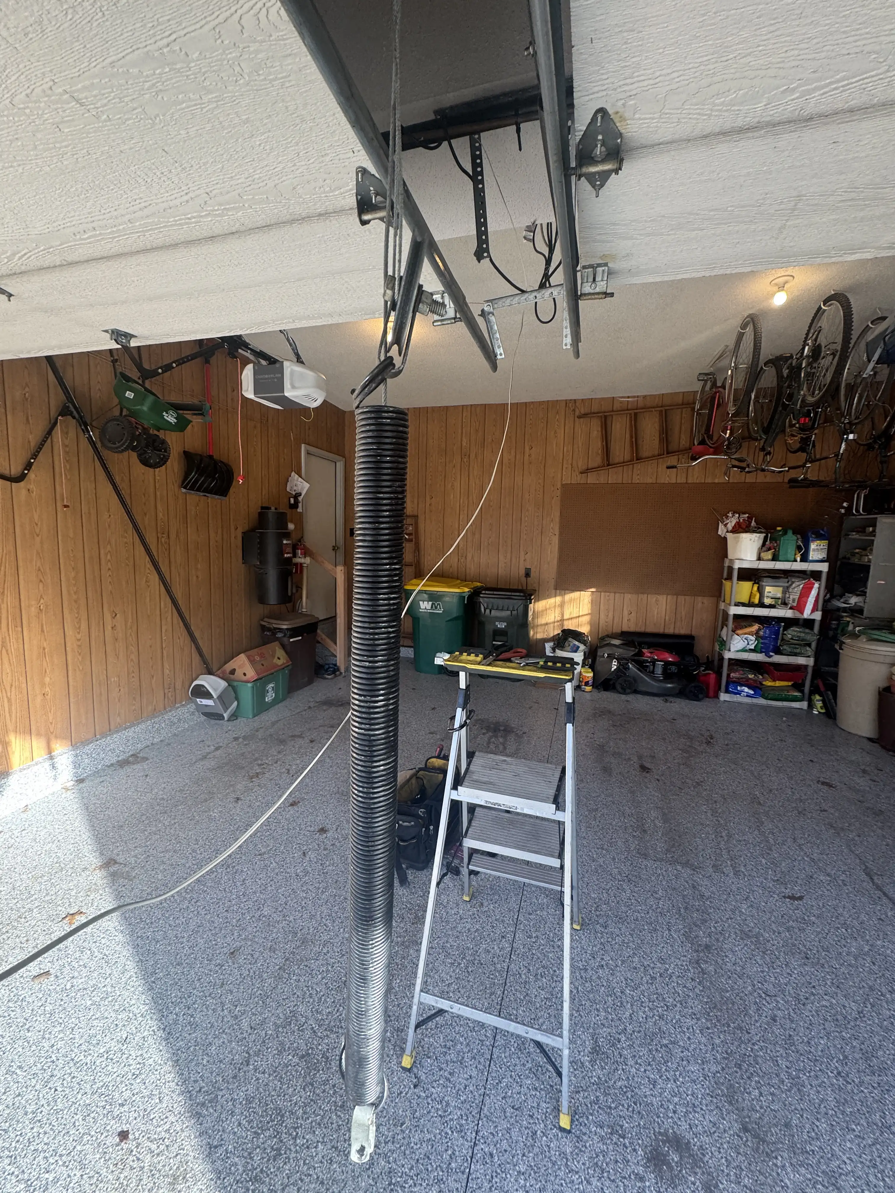 Rusted garage door cable loop found during a service call in Overland Park, KS