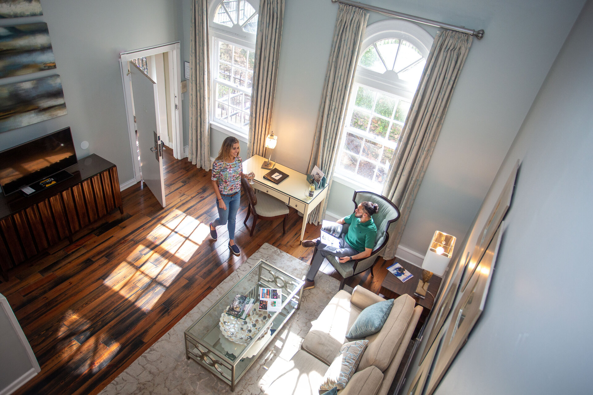 Guest relaxing in a suite at Olde Harbour Inn