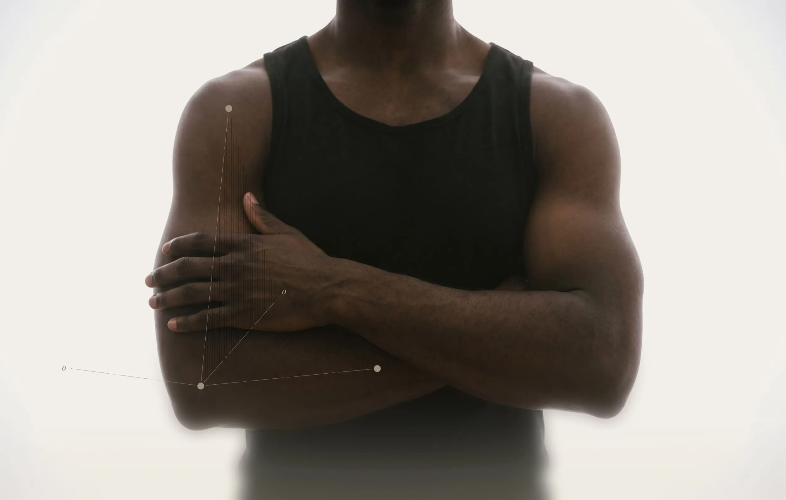 Person with crossed arms and geometric overlay on elbow joint