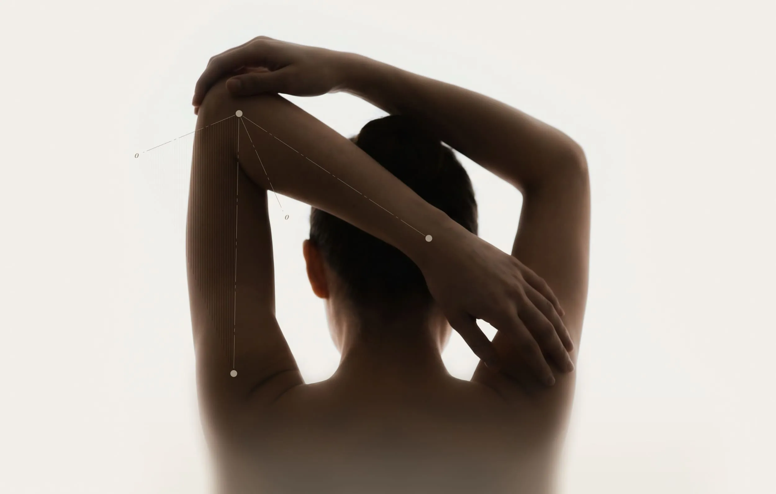 Person touching opposite shoulder showing elbow bending mechanics