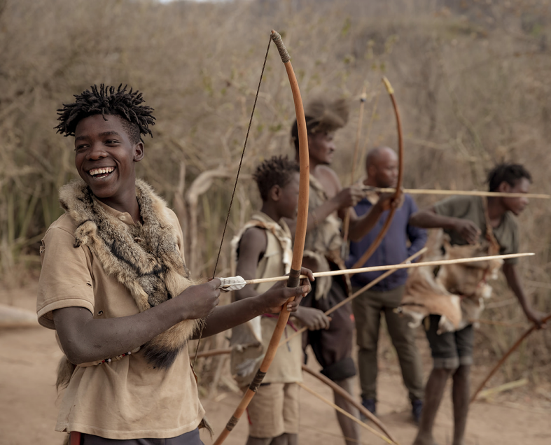 Local Tanzanian guide in the savannah