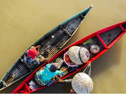 Closing the gap image River transport and community supply-chain access representing closing the development gap