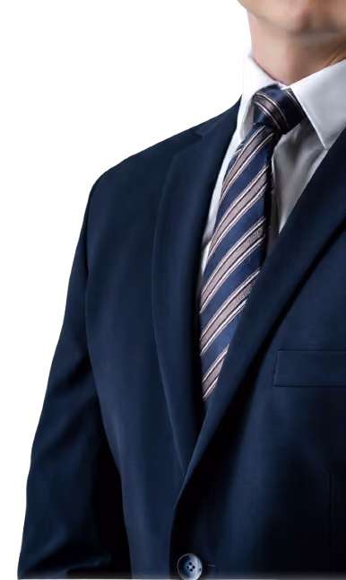 Man wearing a dark blue suit jacket, white shirt, and striped tie, cropped at the neck and shoulder.