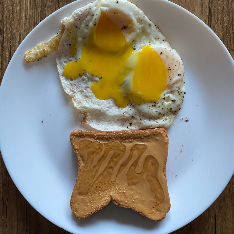 Sunny side up eggs with peanut butter honey toast