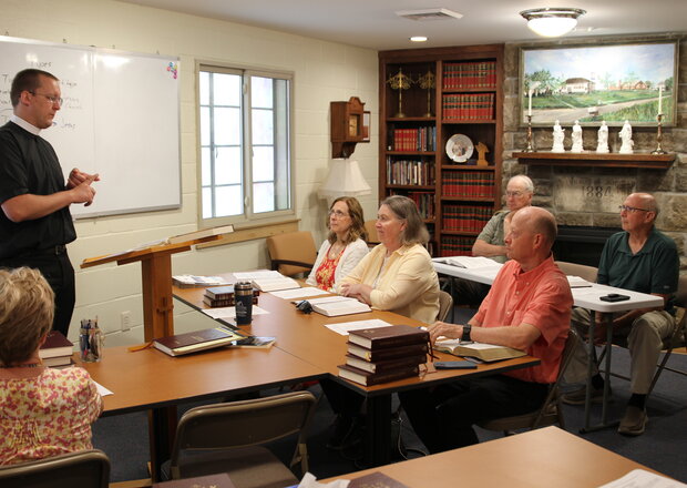 Pastor Woelmer teaches bible class at Trinity Lutheran Church in Paola, Kansas. 