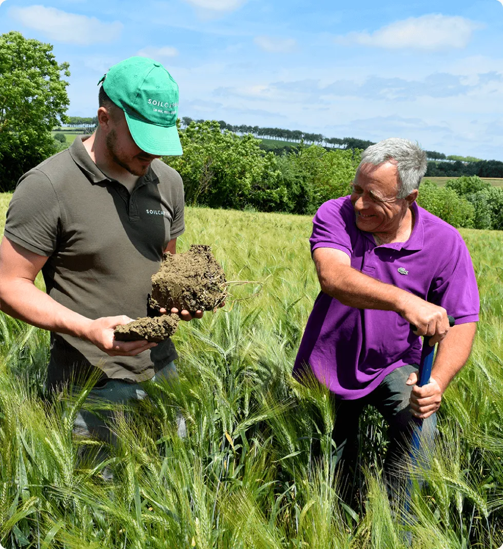 two farmers in field