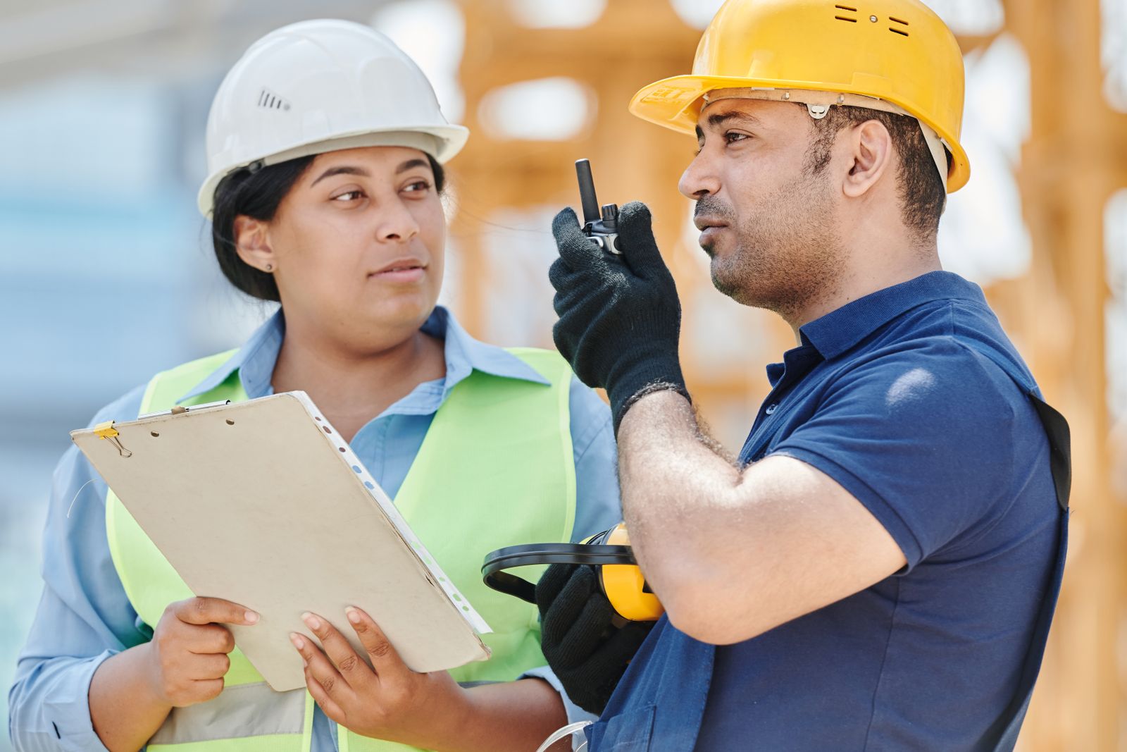 Construction workers wearing hardhats