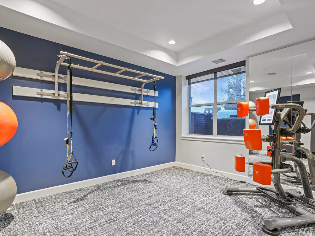 Fitness center with boxing stations and yoga balls